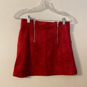 Red zipper velvet skirt.